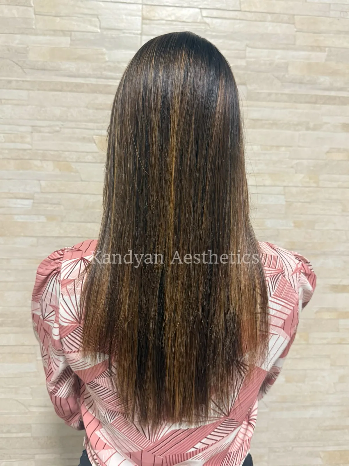 Before and after results of a keratin hair smoothing treatment at Kandyan Aesthetics
