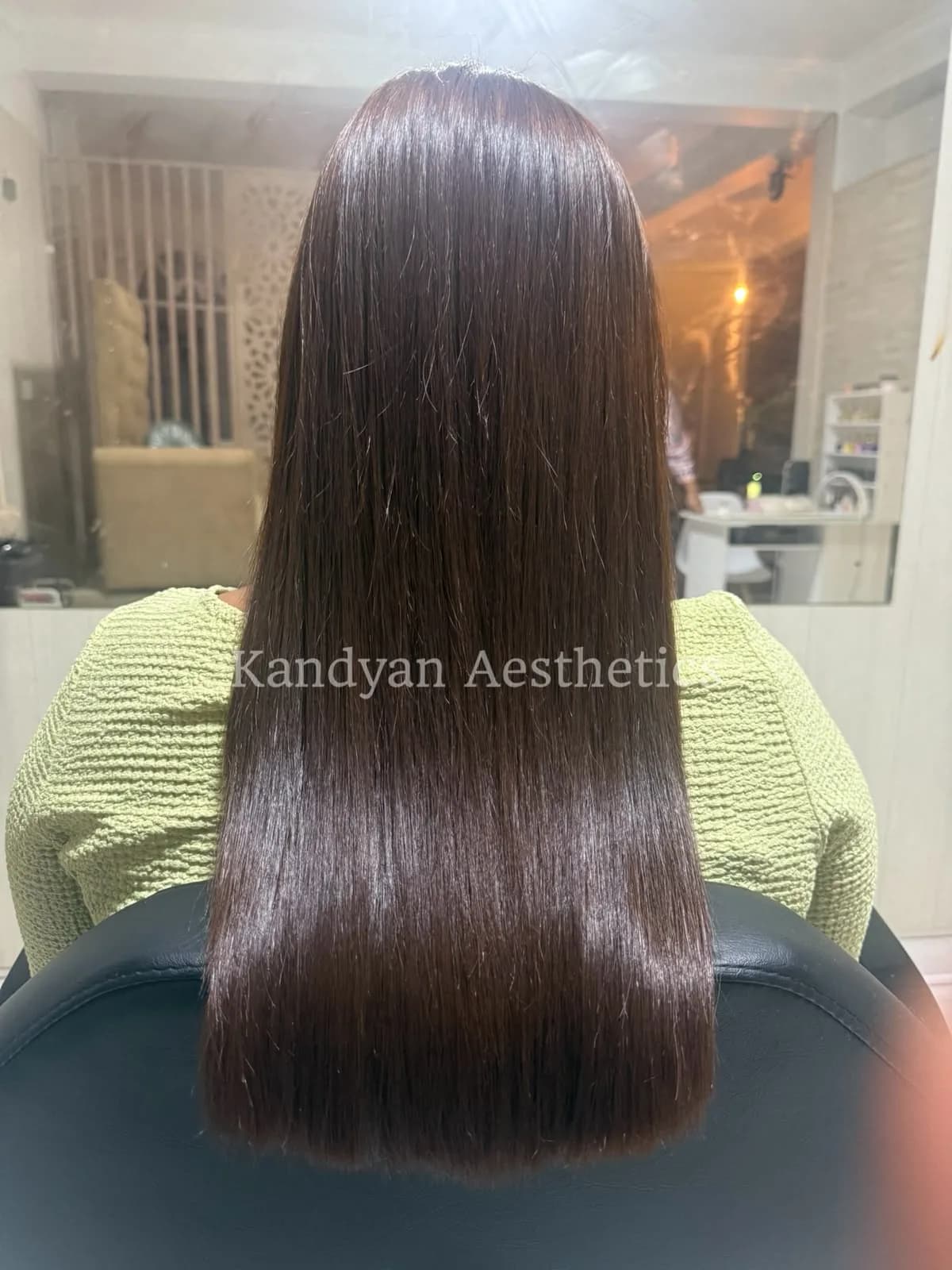 Before and after results of a keratin hair smoothing treatment at Kandyan Aesthetics
